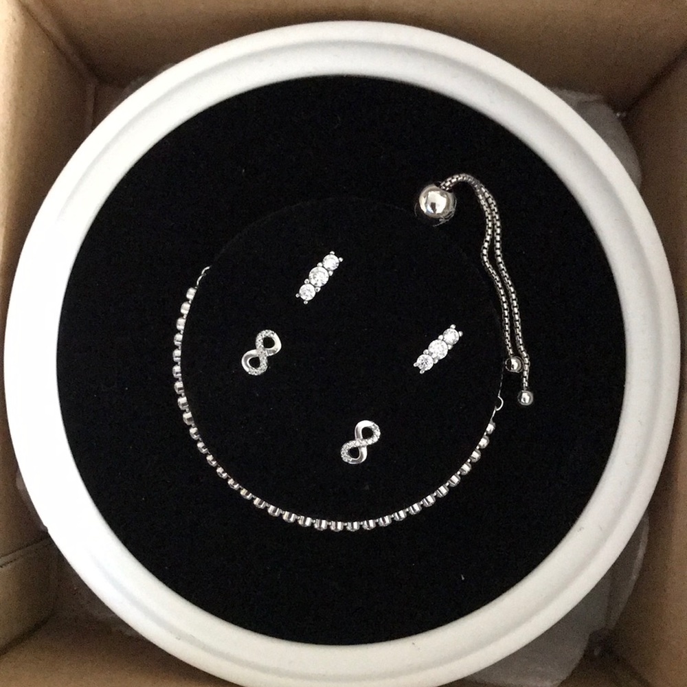 Brand New Pandora Earrings and Bracelet Set.